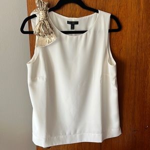 Cream sleeveless blouse